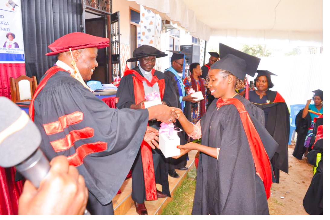 A graduate receiving a gift